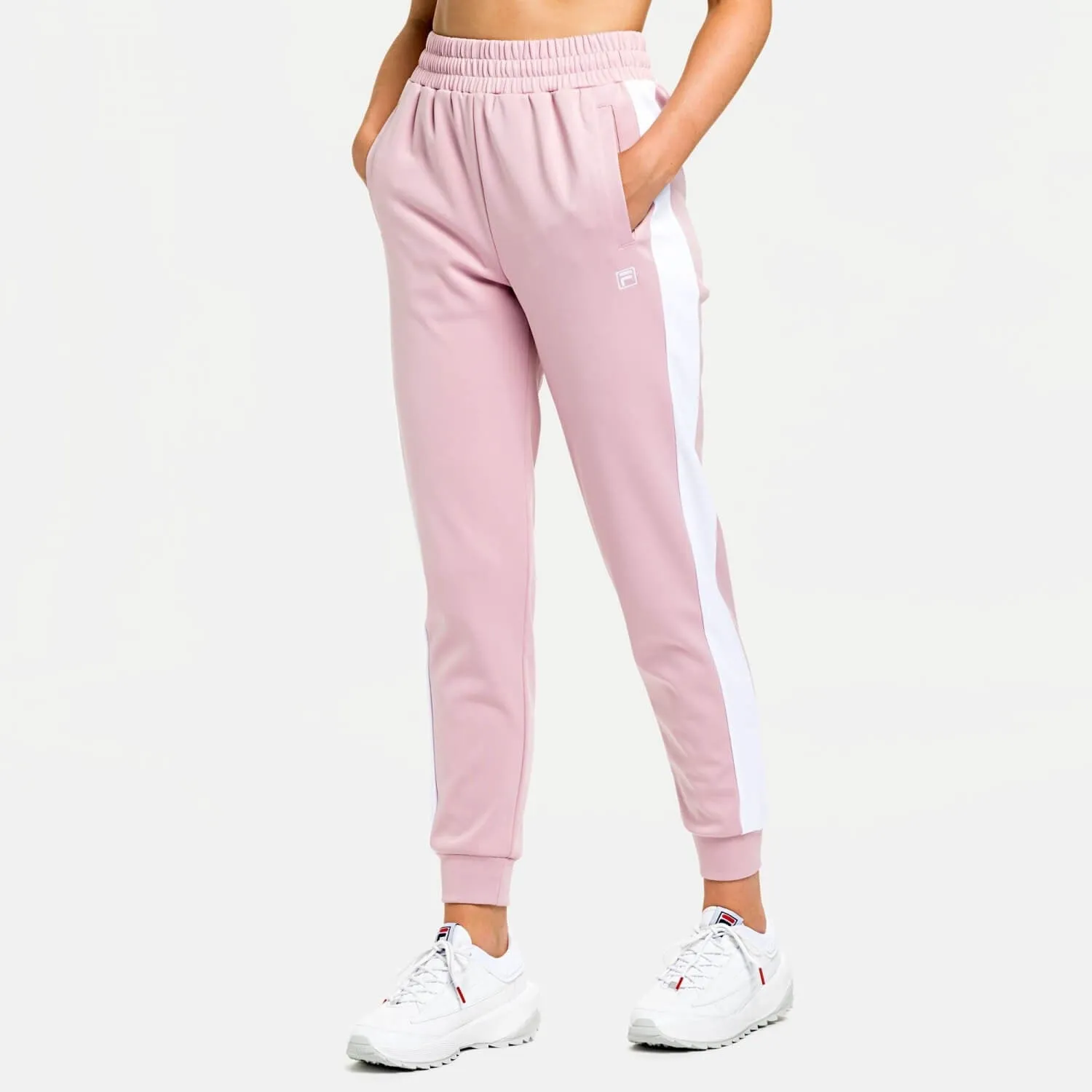 Dámske tepláky FILA wmn's RADIA tapered track pants bledoružové